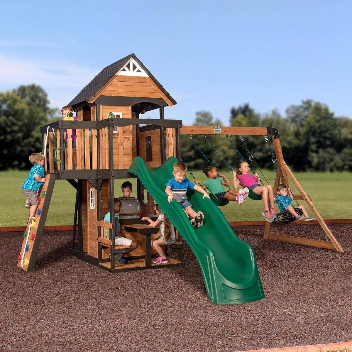 Backyard Discovery Canyon Creek Cedar Wood Swing Set with Wave Slide. Clubhouse. Play Kitchen. Picnic Area. Belt Swings. Web Swing. Rock Wall. Balconies. Playhouse. Step Ladder. Outdoor Playset