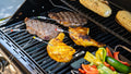 4-Burner Smart Gas Grill with Side Searing Burner. Black with Chrome Accents